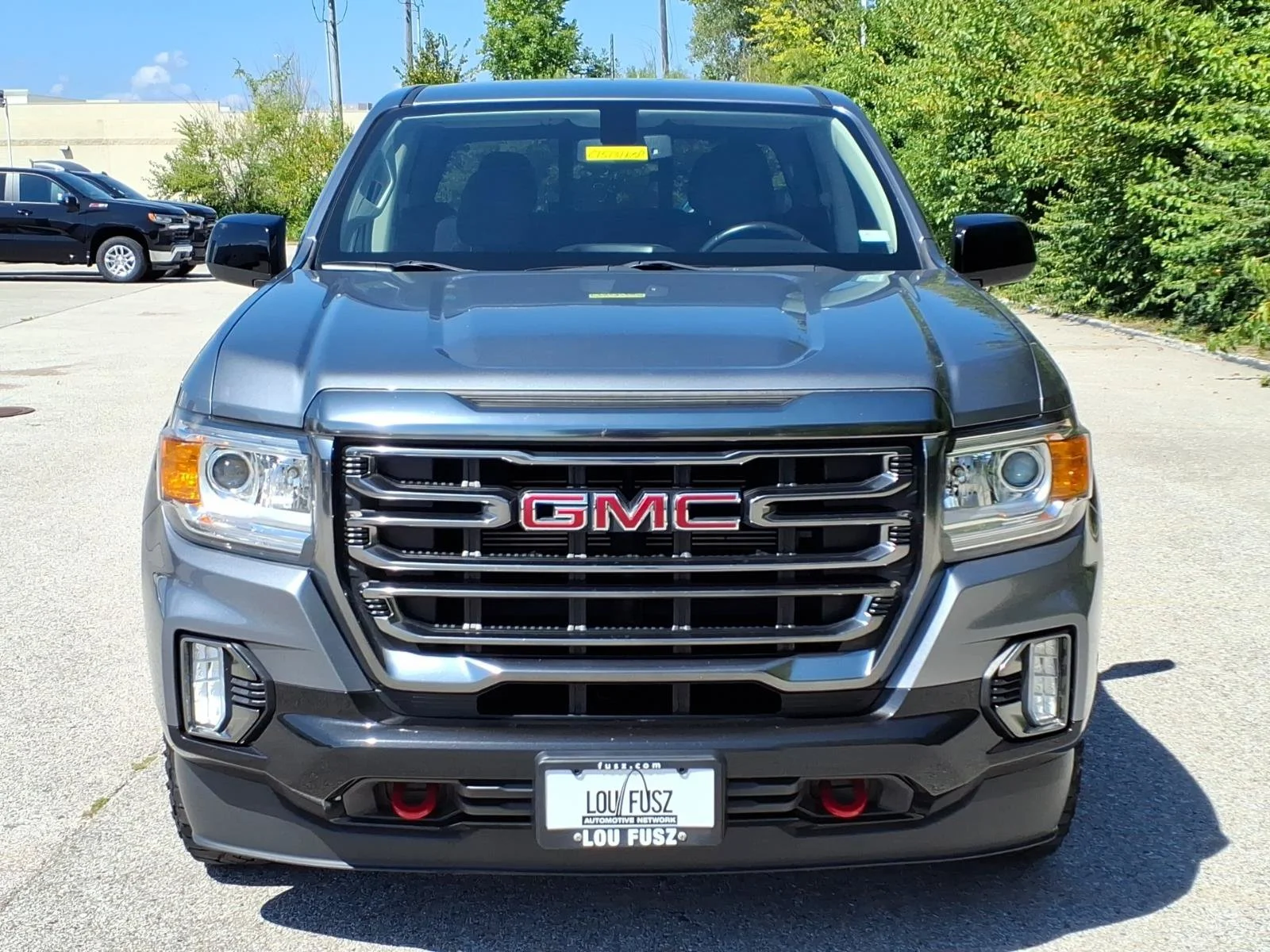 Used 2022 Satin Steel Metallic GMC 4WD AT4 with Leather image 32