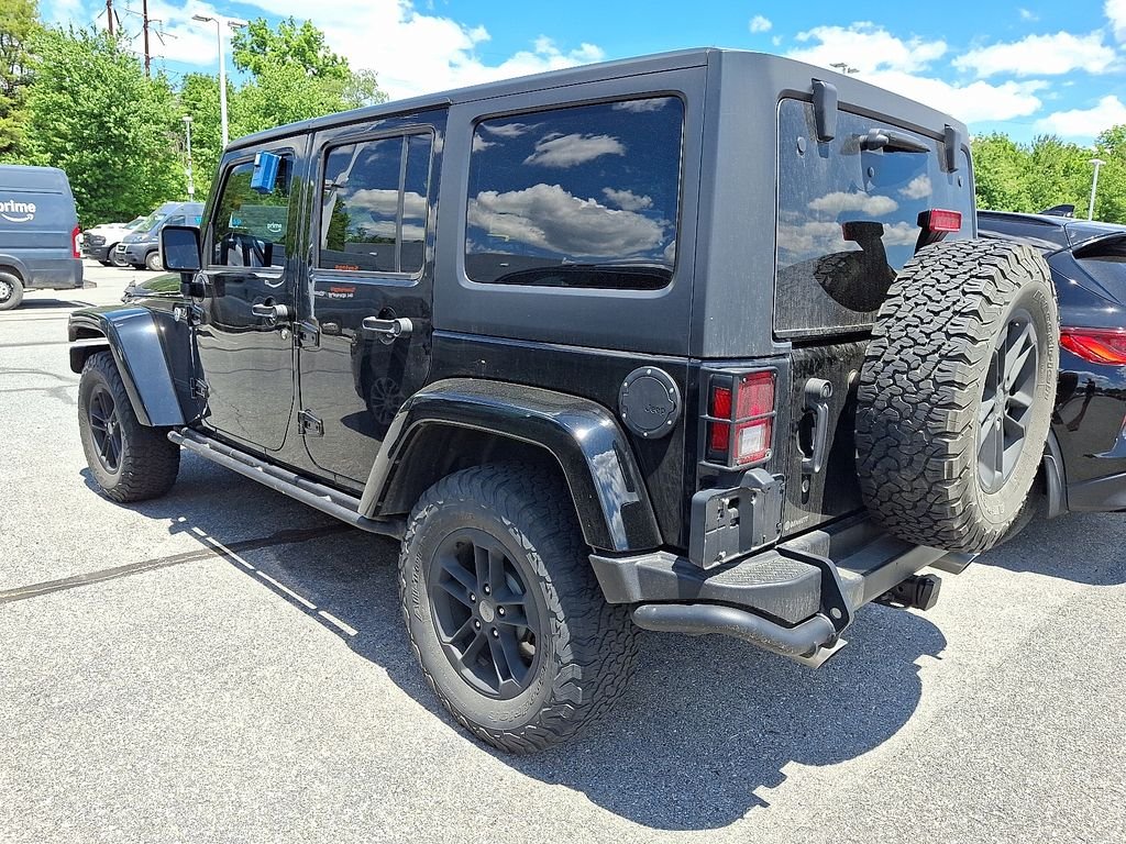 Used 2017 Black Jeep Unlimited Sahara image 4