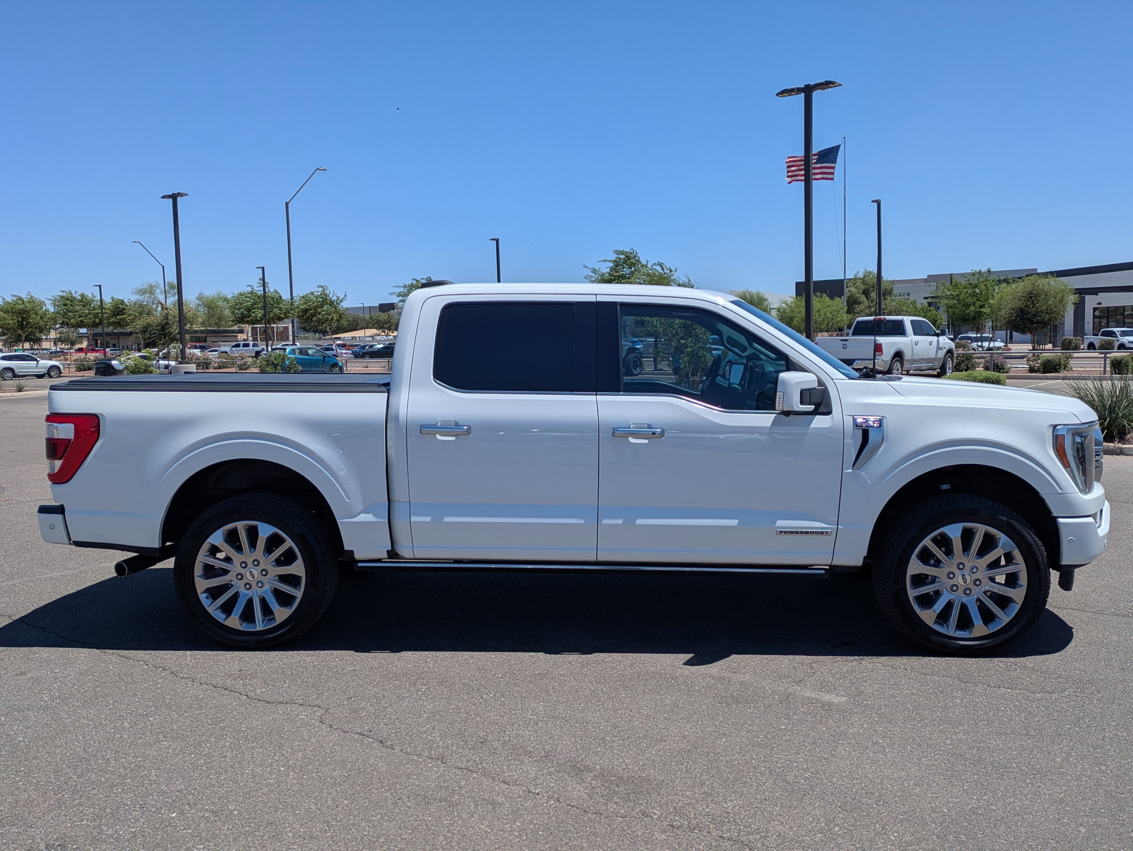 Used 2023 White Metallic Ford Limited image 6