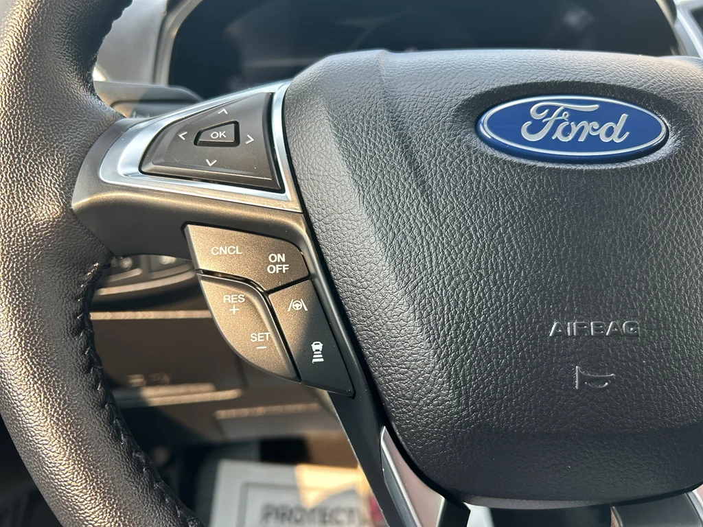Used 2023 Agate Black Metallic Ford SEL image 12