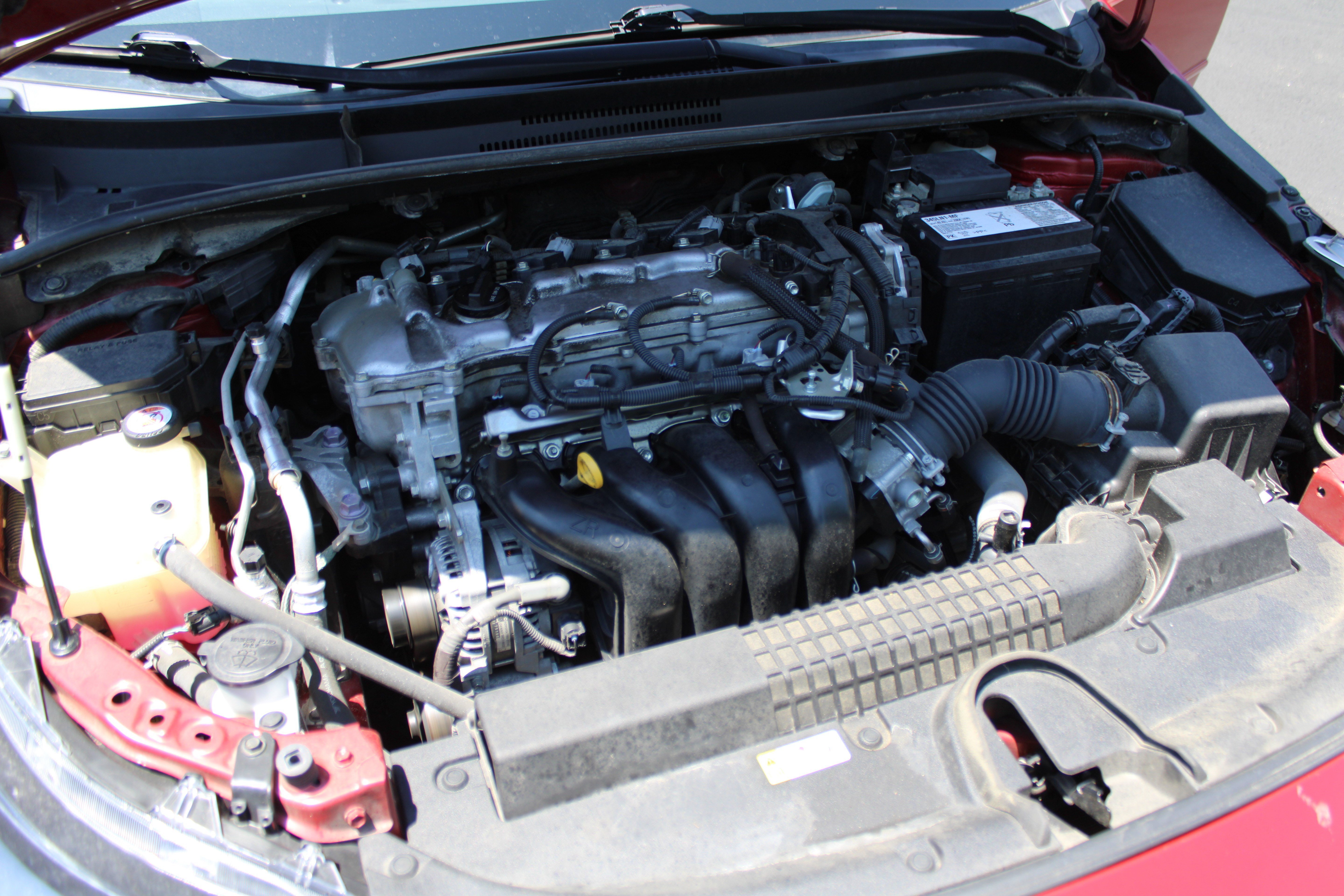 Used 2020 Barcelona Red Metallic Toyota LE image 11