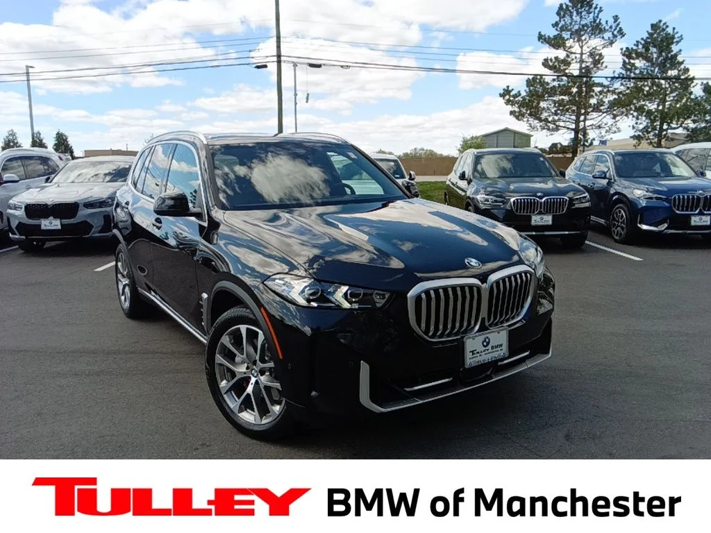 Certified Used 2025 Black Sapphire Metallic BMW xDrive40i image 1