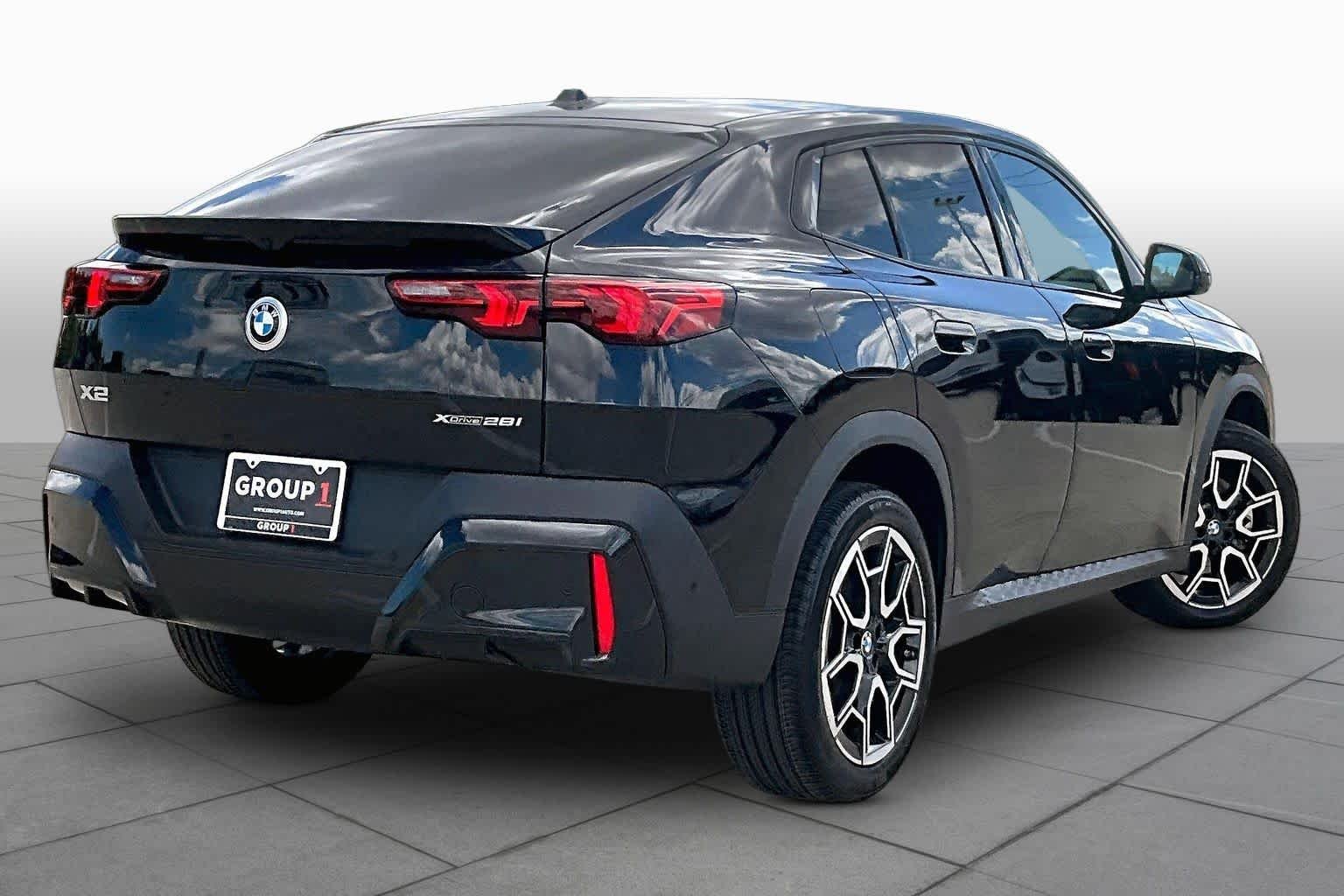 Used 2026 Black Sapphire Metallic BMW xDrive28i image 12