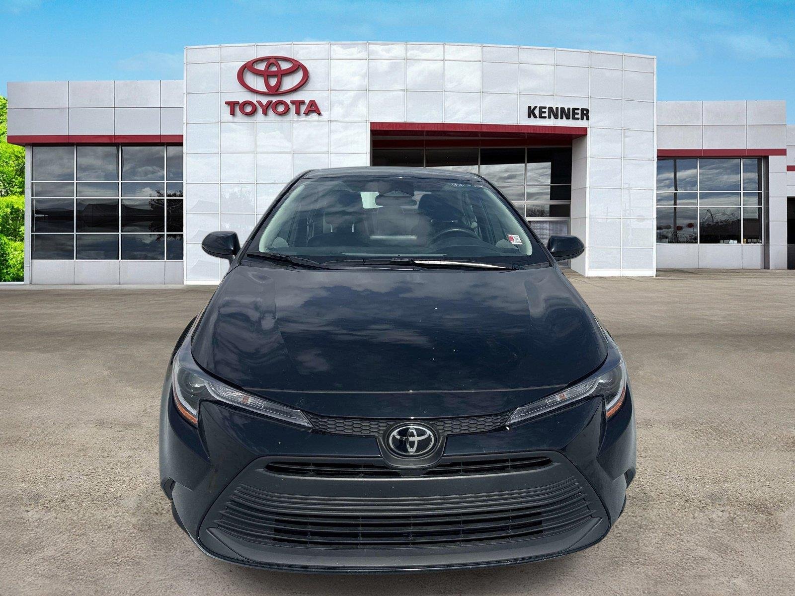 Used 2025 Midnight Black Metallic Toyota LE image 2
