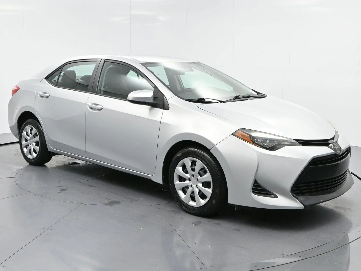 Used 2019 Classic Silver Metallic Toyota LE image 2