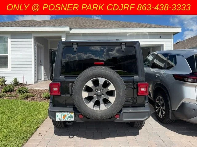 Used 2022 Black Jeep Unlimited Sahara image 4
