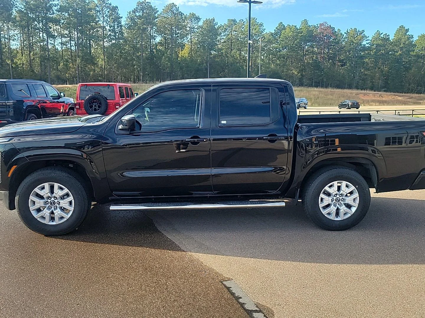 Used 2023 Super Black Nissan SV image 2