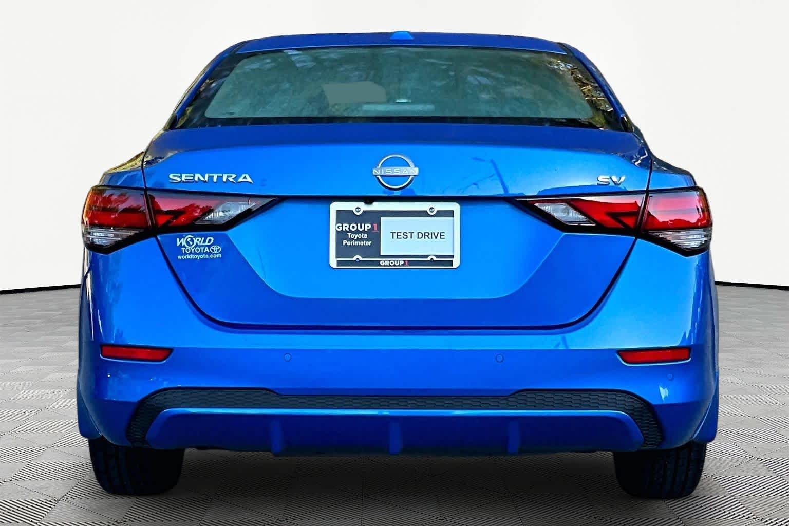 Used 2024 Electric Blue Metallic Nissan SV image 5