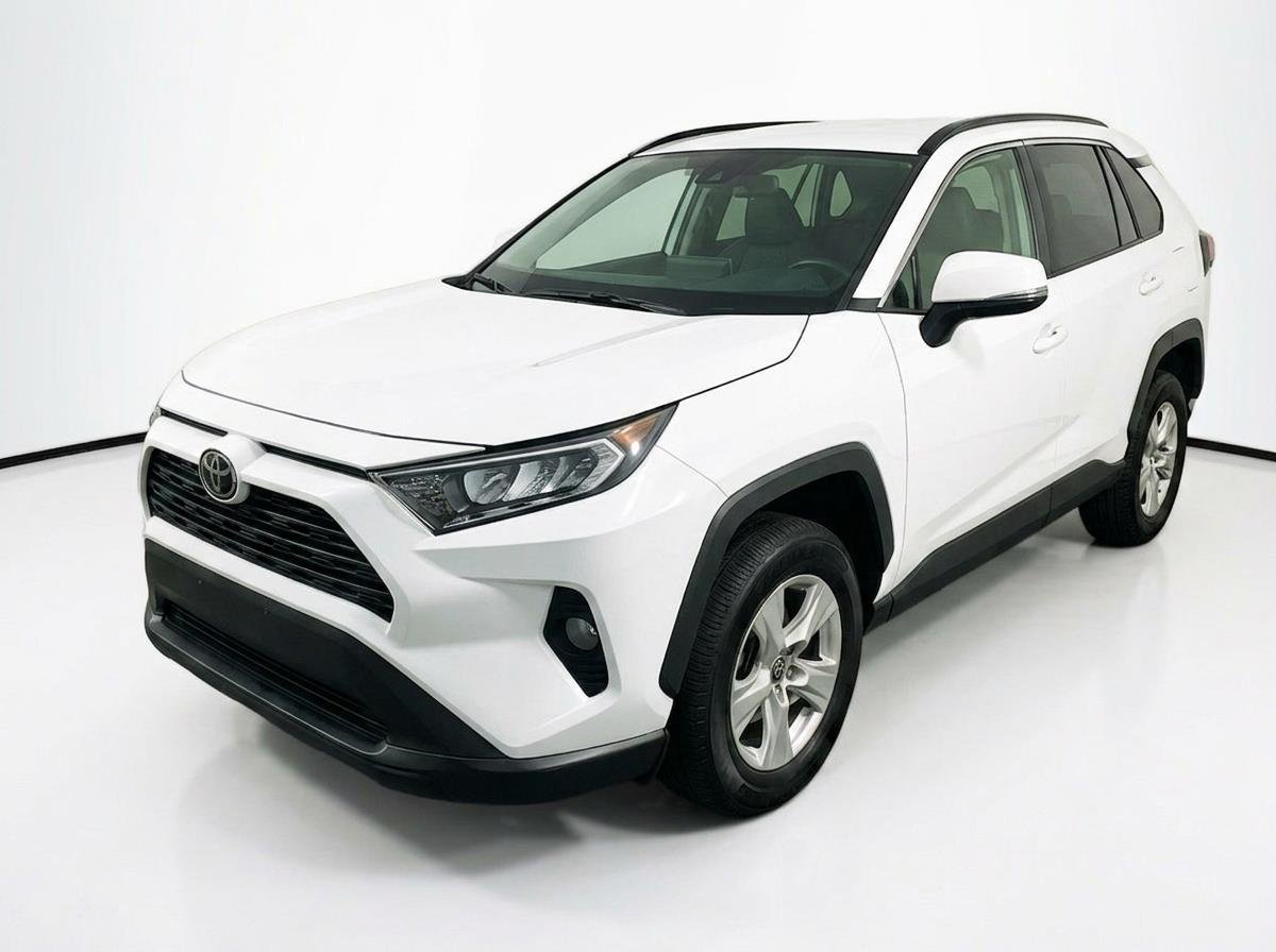Used 2020 Super White Toyota XLE image 1