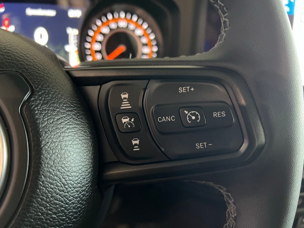 Used 2025 Granite Crystal Metallic Clear Jeep Sport S image 19