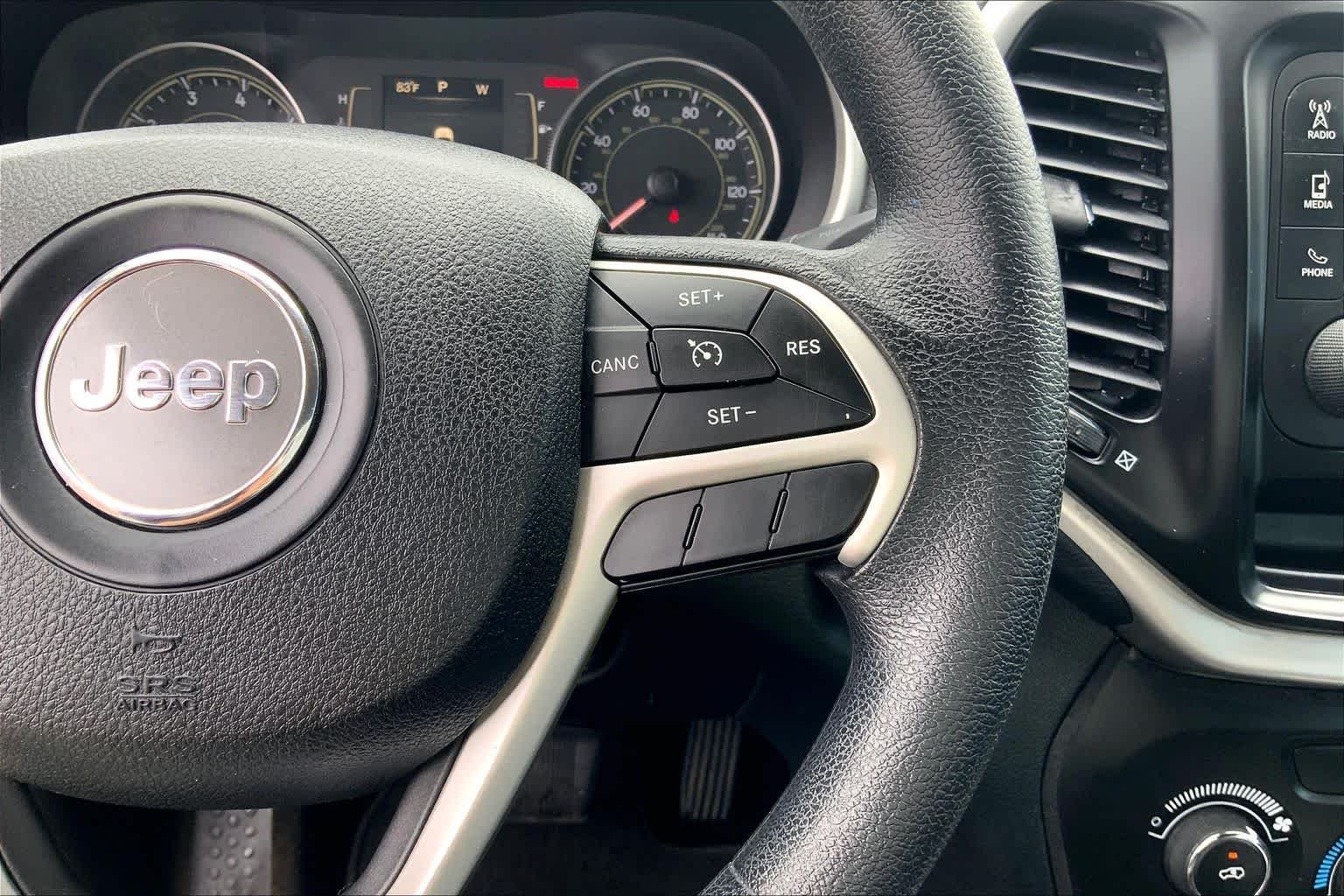 Used 2014 Brilliant Black Crystal Pearlcoat Jeep Sport image 23