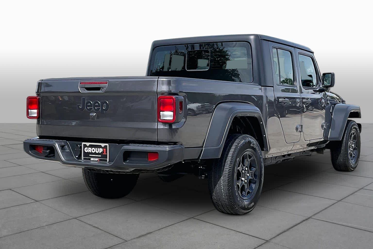 Used 2023 Granite Crystal Metallic Clearcoat Jeep Sport image 13