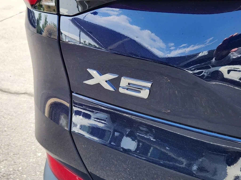 New 2026 Tanzanite Blue II Metallic BMW xDrive50e image 19