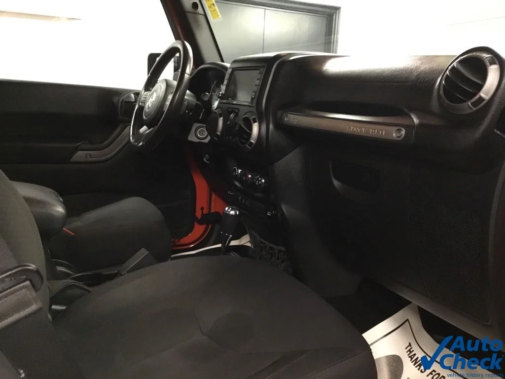 Used 2015 Orange Jeep Unlimited Sport image 39