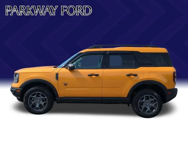Used 2023 Orange Ford Badlands image 2
