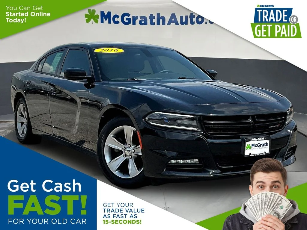 Used 2016 Black Dodge SXT image 1
