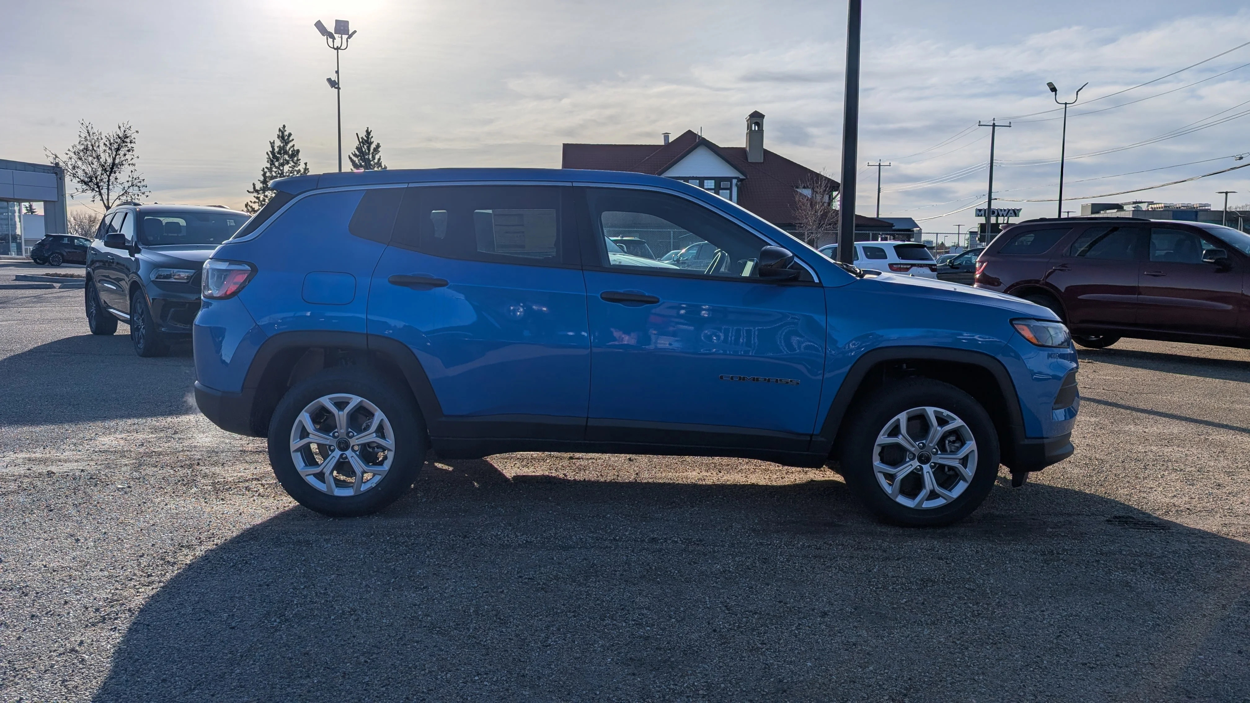 New 2026 Laser Blue Pearl Jeep Sport image 8