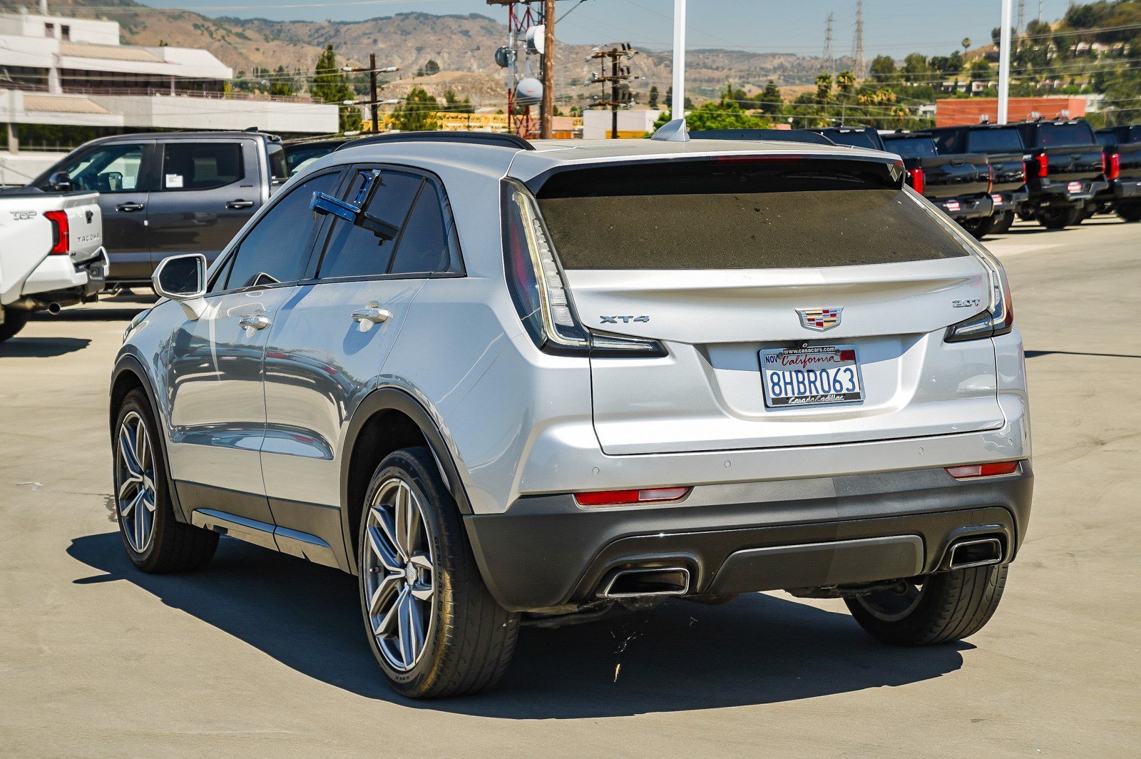 Used 2019 Radiant Silver Metallic Cadillac FWD Sport image 4
