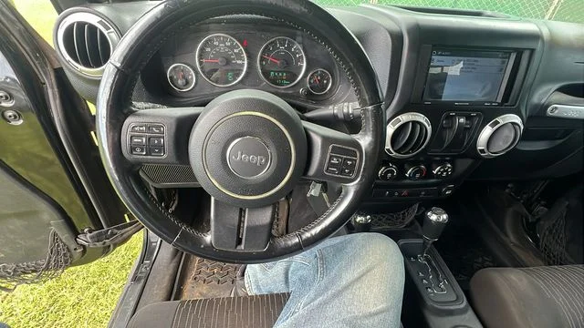 Used 2012 Black Jeep Sahara image 16