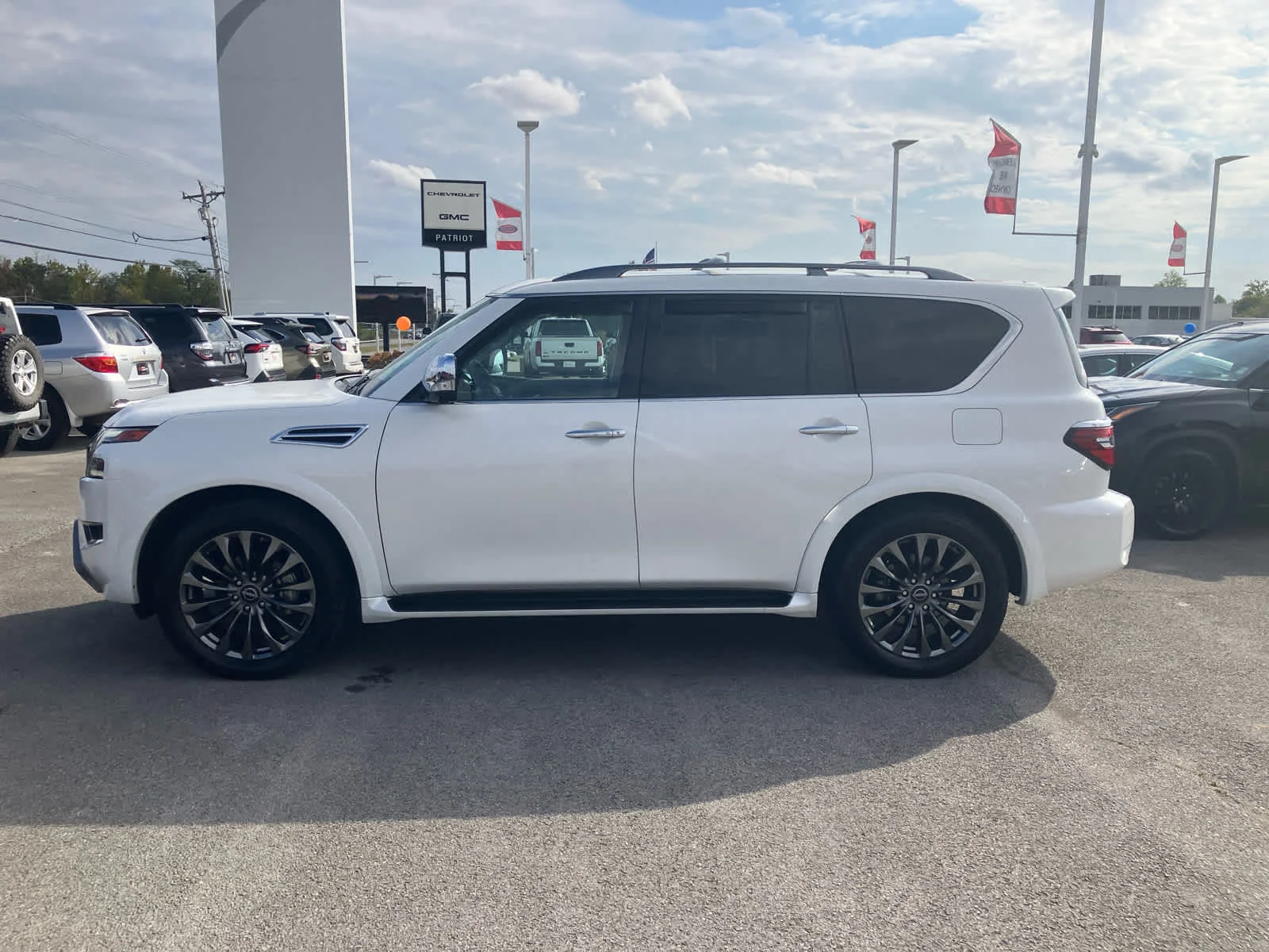 Used 2024 Aspen White Tricoat Nissan Platinum image 4