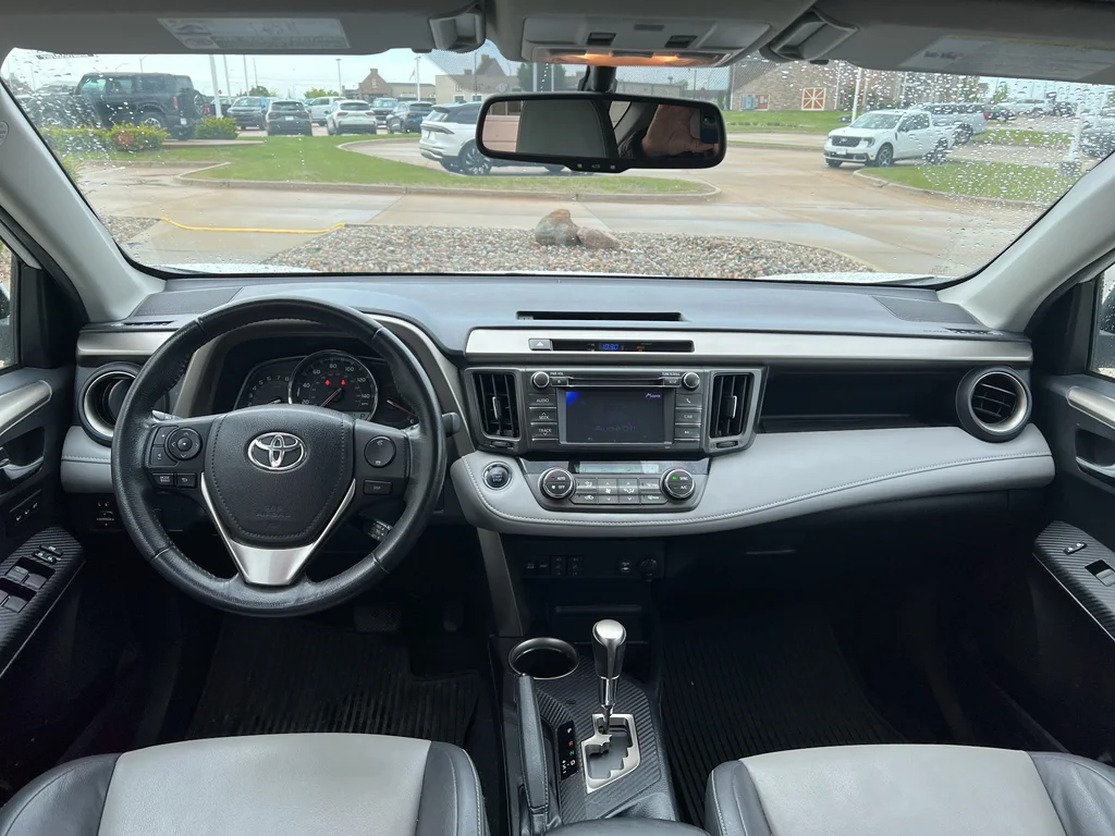 Used 2013 Toyota RAV4 Limited with VIN 2T3YFREV5DW059749 for sale in Pella, IA