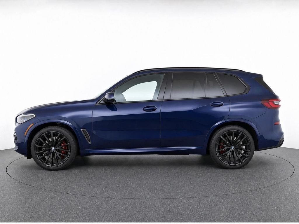 Used 2021 Tanzanite Blue II Metallic BMW M50i image 6