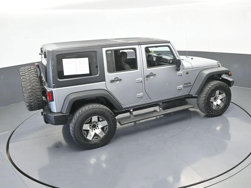 Used 2016 Billet Silver Metallic Clearcoat Jeep Unlimited Sport image 42