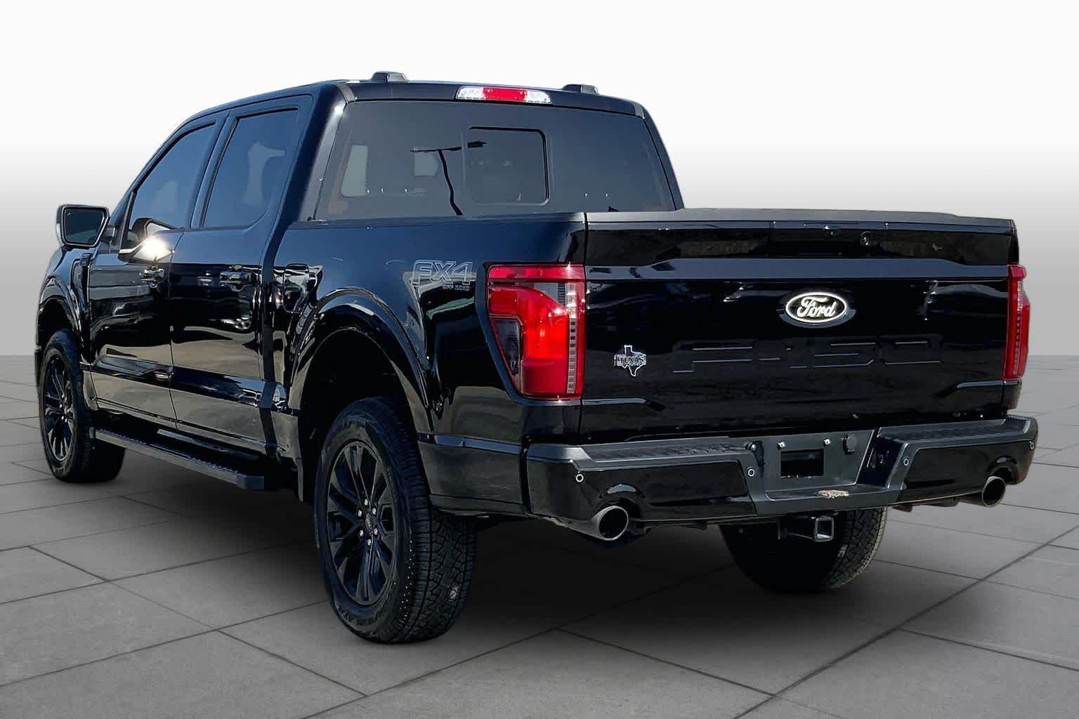 Used 2025 Agate Black Metallic Ford XLT image 11