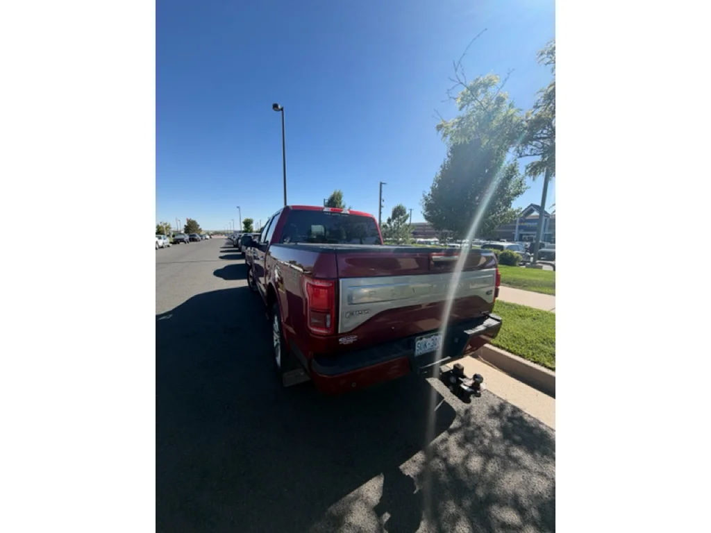 Used 2015 Ruby Red Metallic Tinted Clearcoat Ford Platinum image 3
