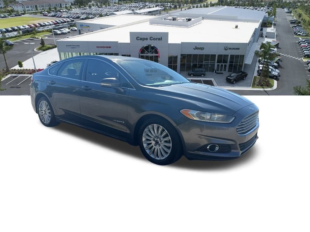Used 2016 Ford Fusion Hybrid SE with VIN 3FA6P0LU8GR130404 for sale in Cape Coral, FL