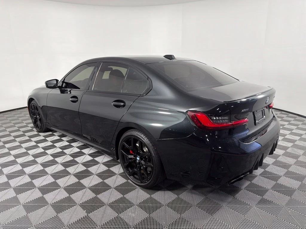 Certified Used 2025 Black Sapphire Metallic BMW M340i xDrive image 7