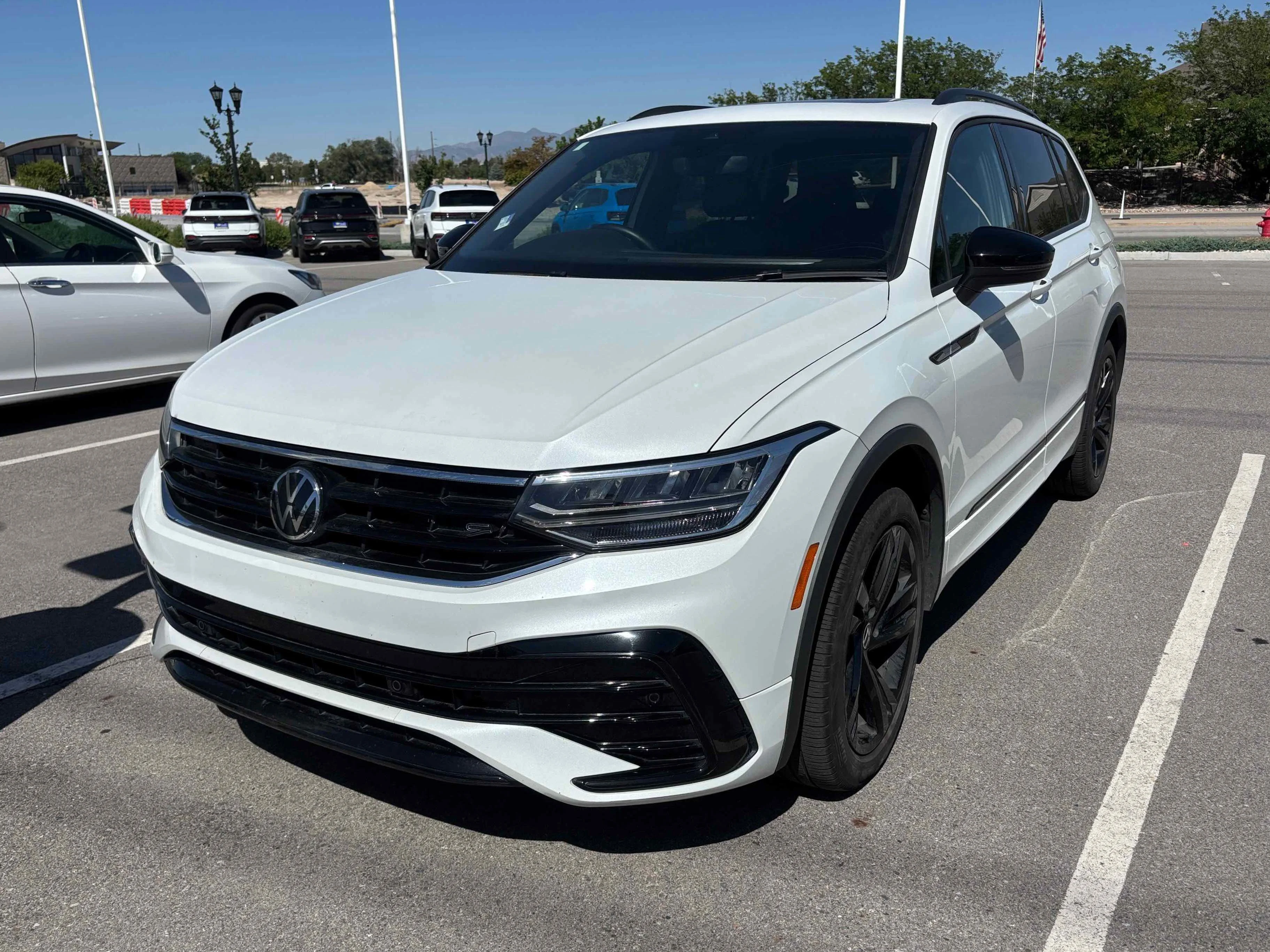 Used 2024 Opal White Volkswagen SE R-Line Black image 1