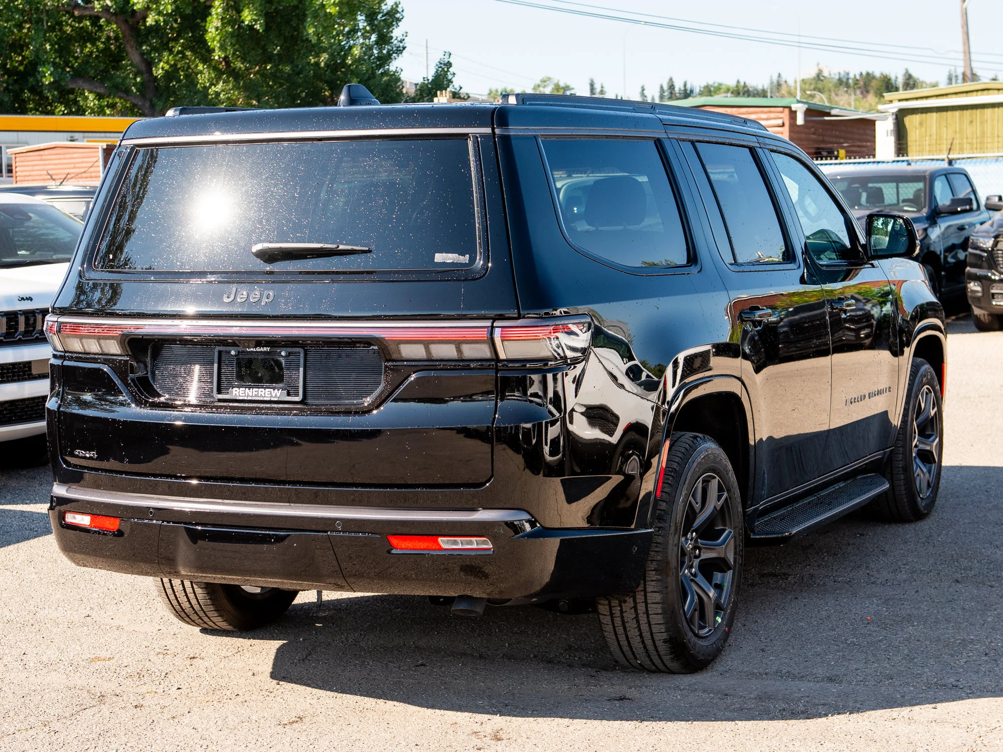 New 2026 Black Jeep Limited Altitude* image 7