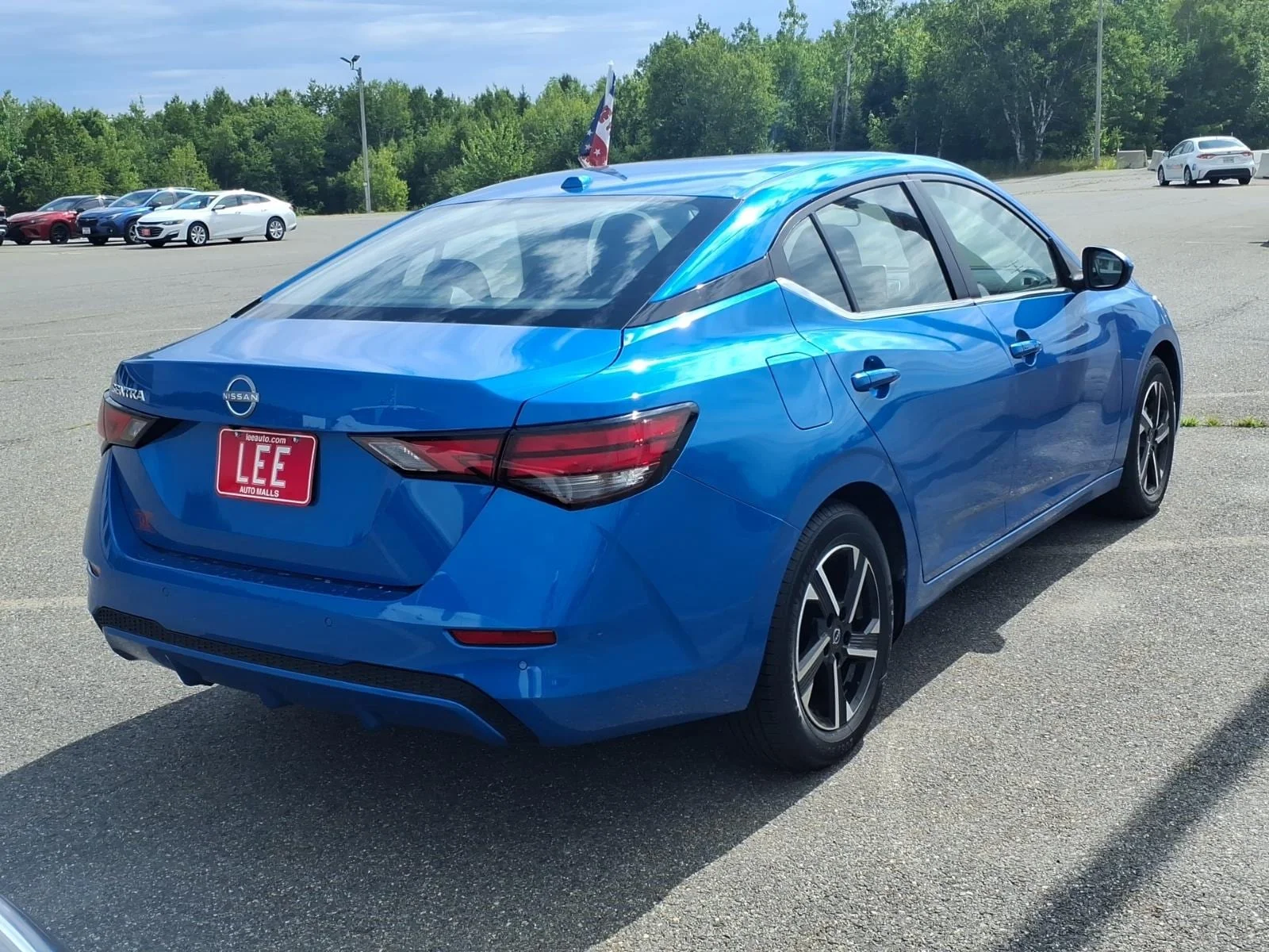 Used 2025 Electric Blue Metallic Nissan SV image 5