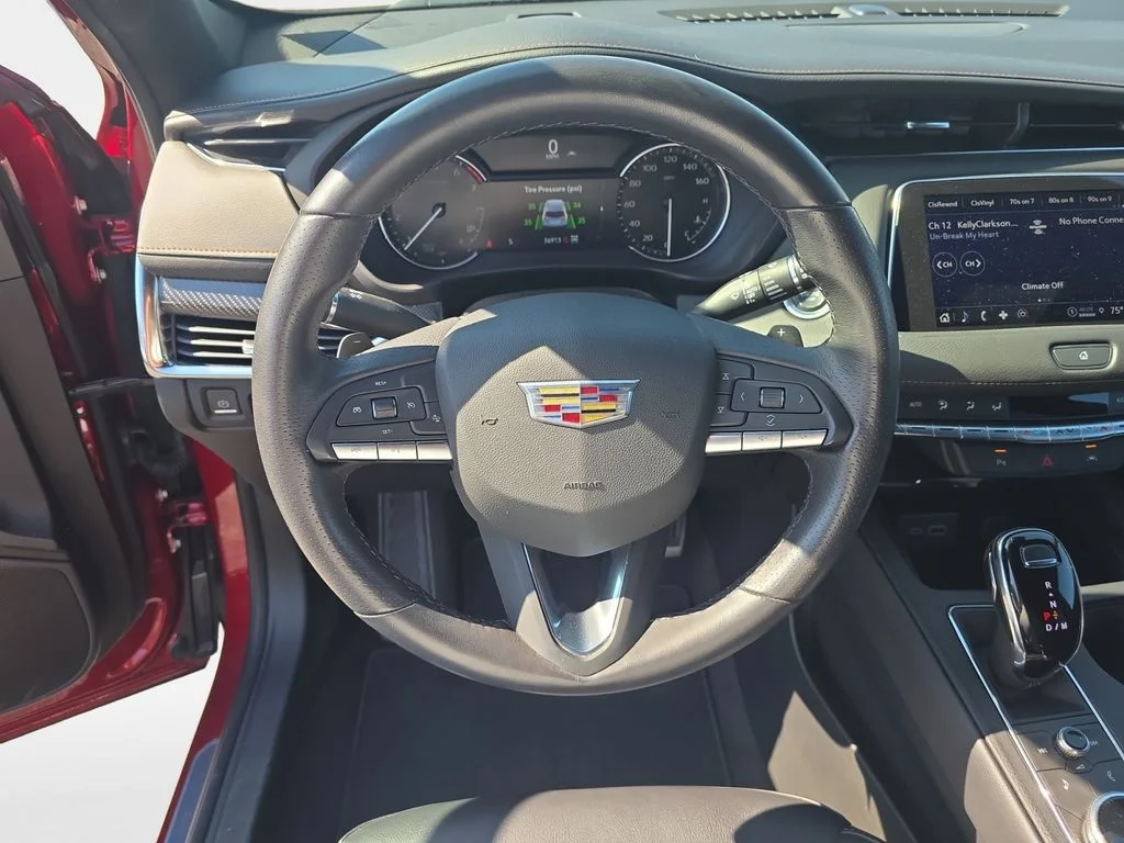 Used 2023 Radiant Red Tintcoat Cadillac Sport image 13