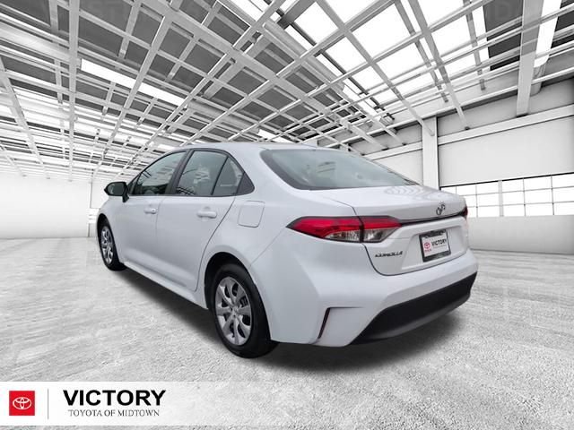 Used 2024 White Toyota LE image 6
