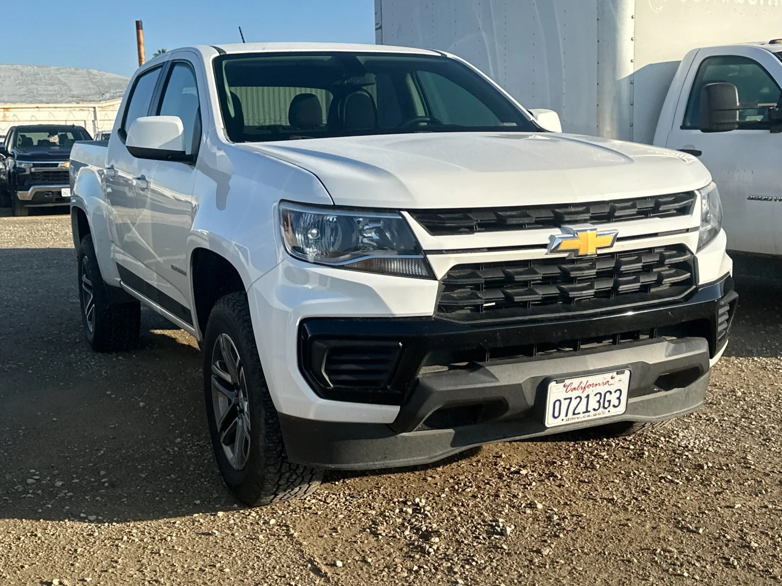 Used 2021 SUMMIT WHITE Chevrolet 2WD Work Truck image 2