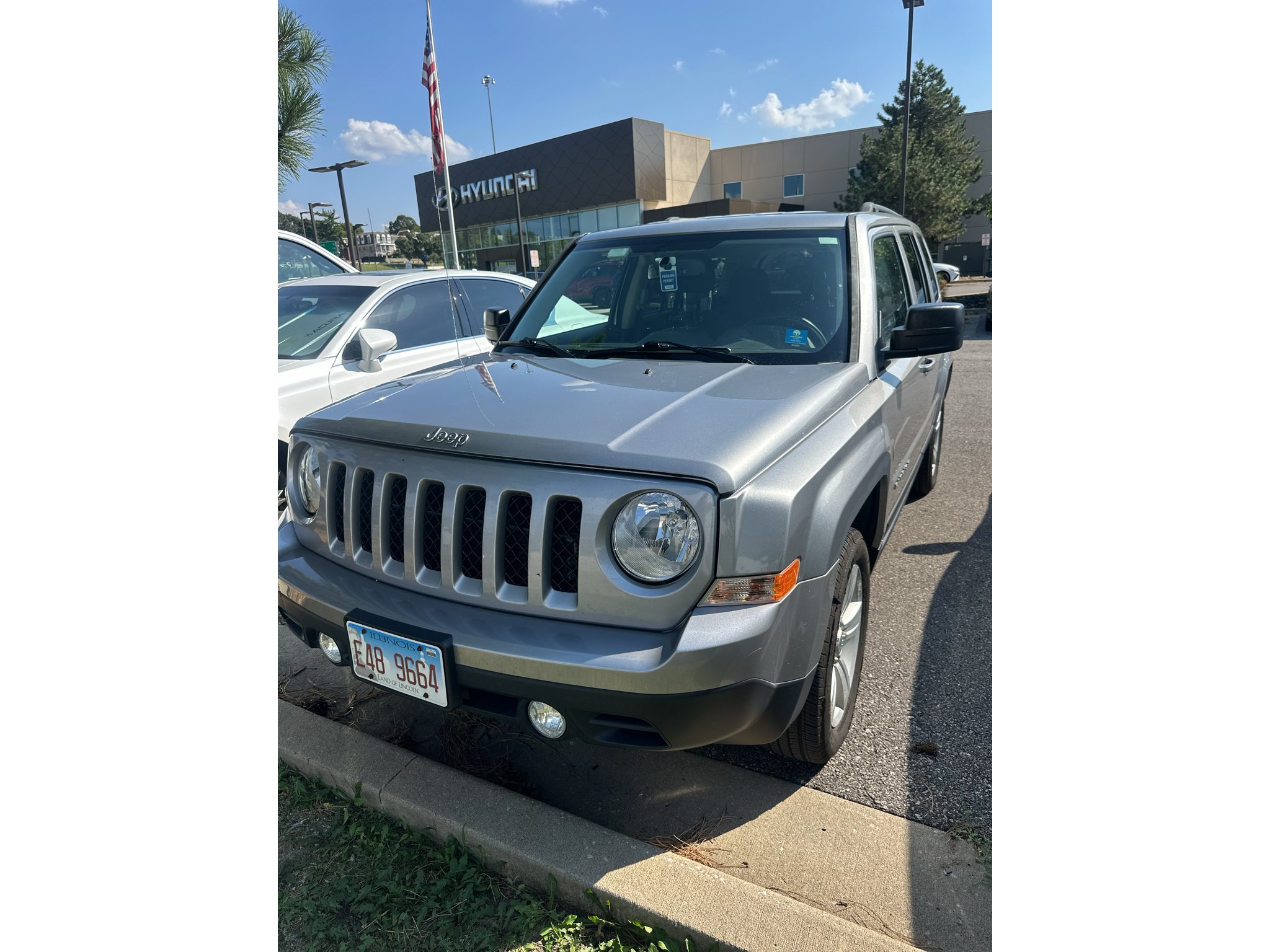 Used 2014 Billet Silver Metallic Clearcoat Jeep Latitude image 1