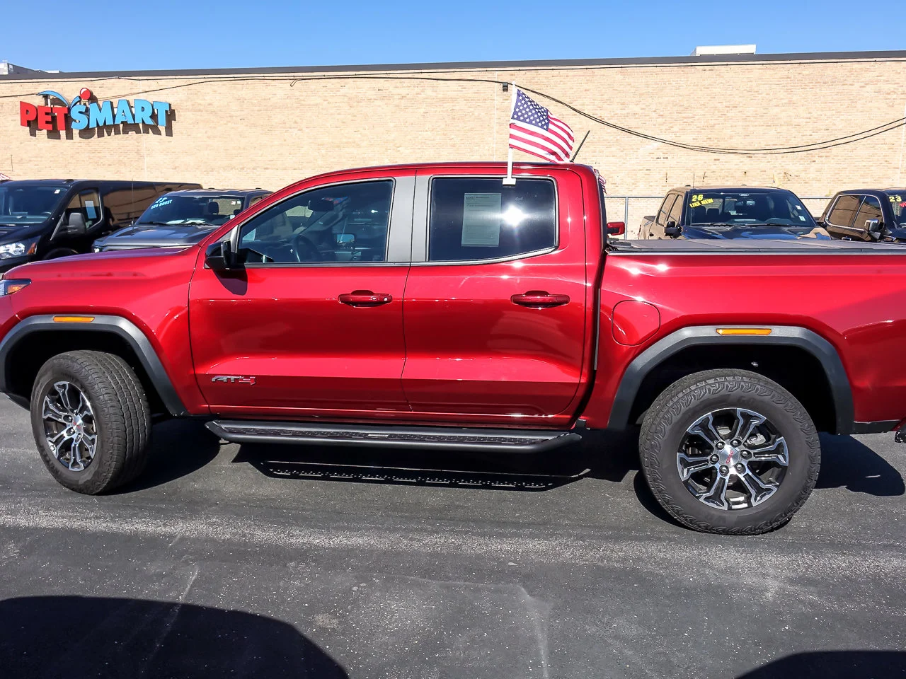 Used 2024 Volcanic Red Tintcoat GMC 4WD AT4 image 4
