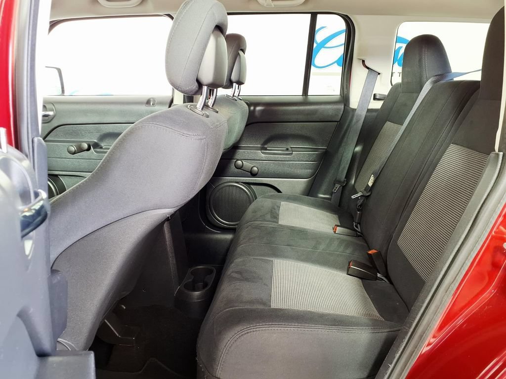 Used 2011 Deep Cherry Red Jeep Sport image 10