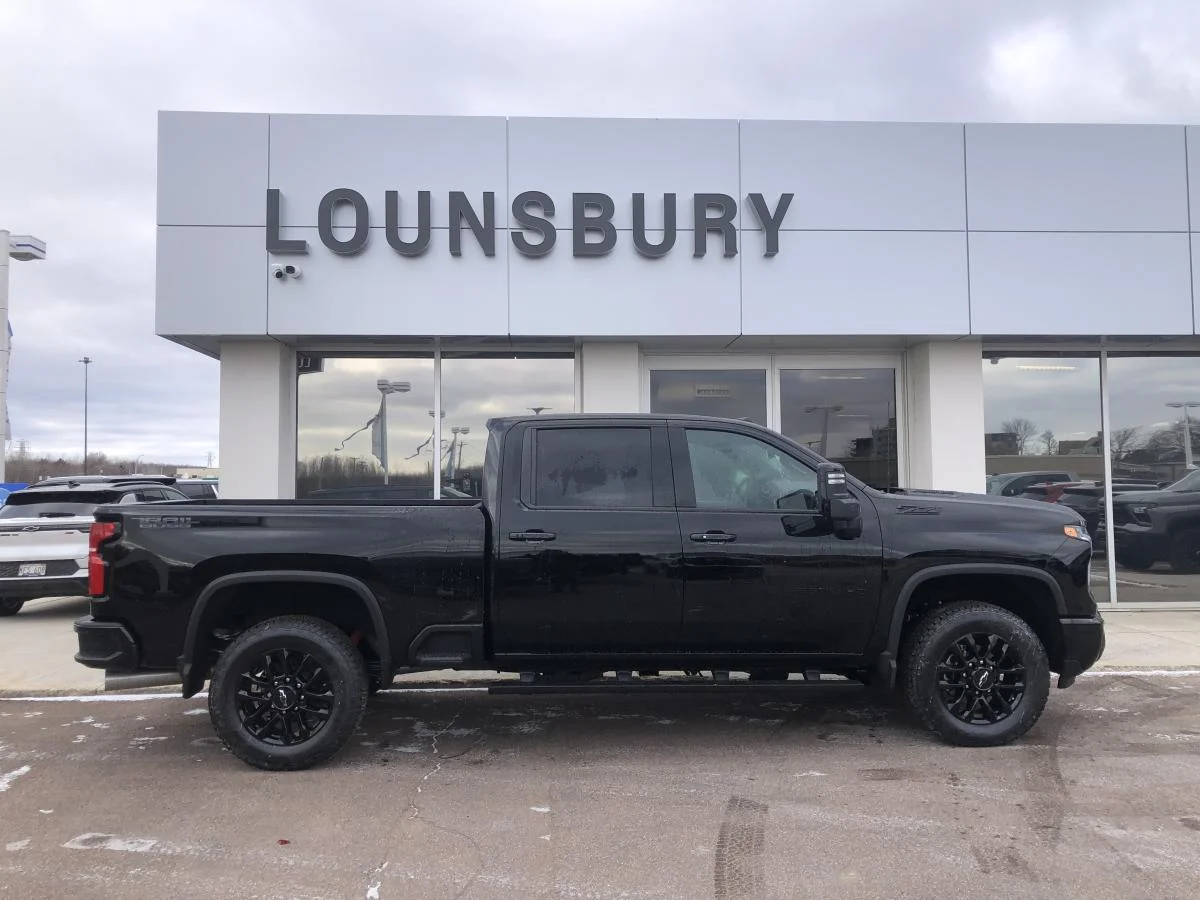 Used 2026 Black Chevrolet 4WD Crew Cab 159" LTZ image 2