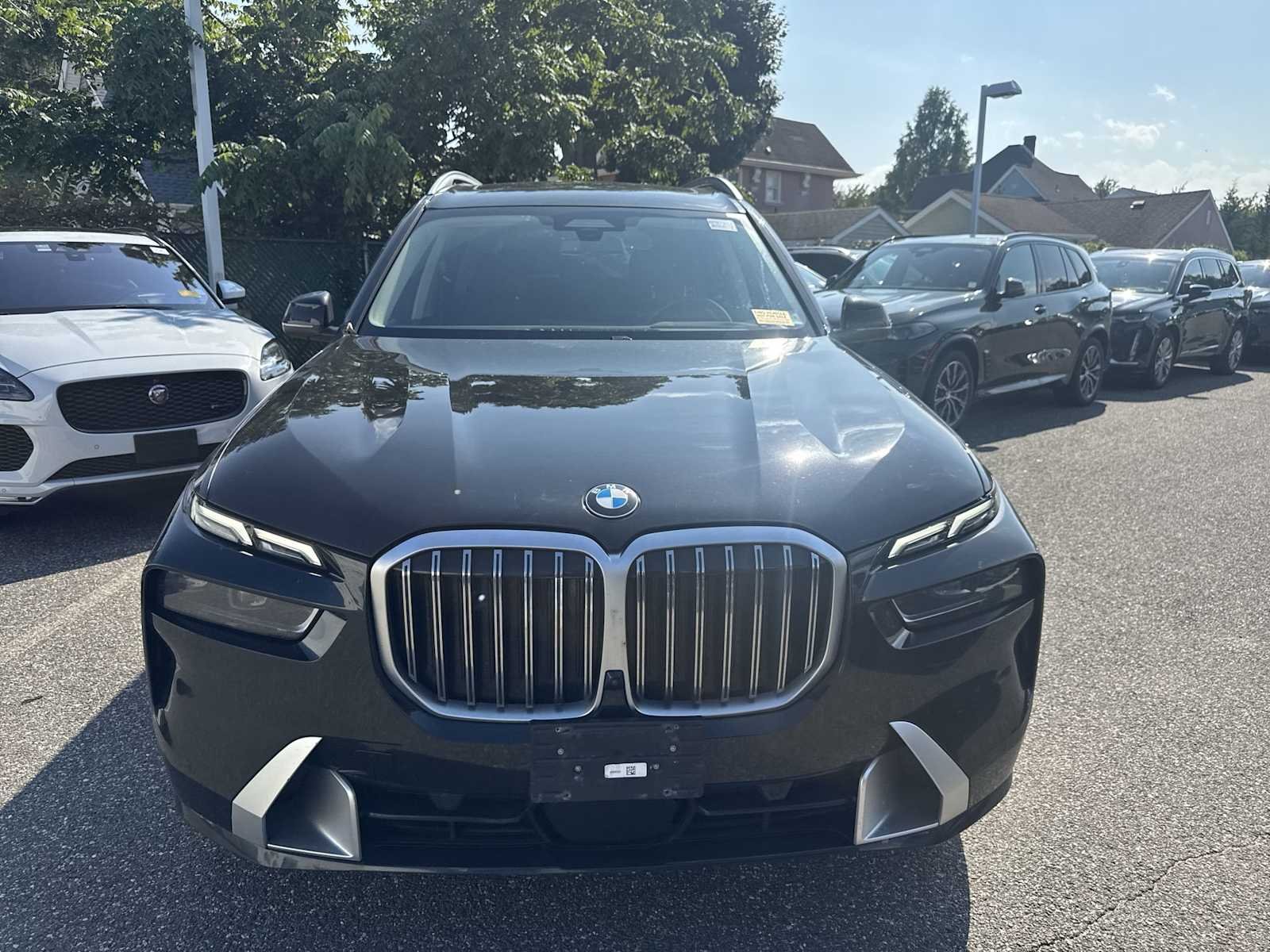 Certified Used 2024 Black Sapphire Metallic BMW xDrive40i image 2