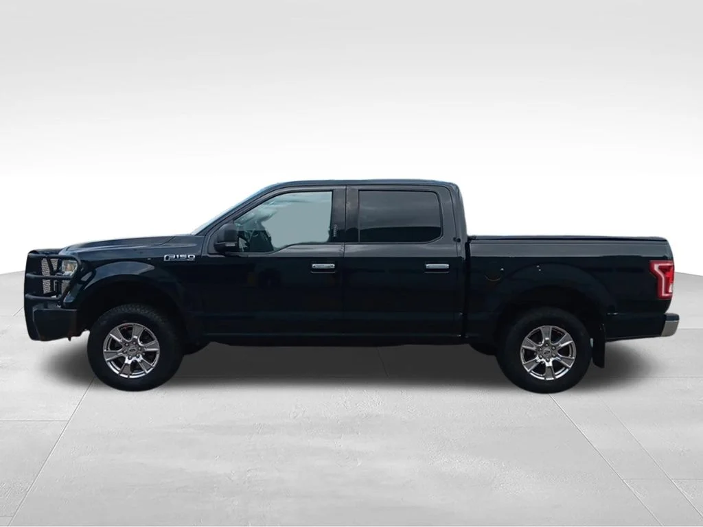 Used 2015 Tuxedo Black Metallic Ford XLT image 4