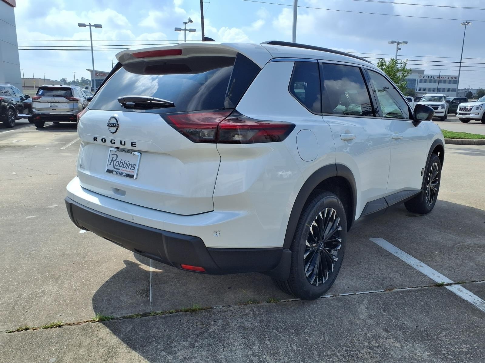 2026 Nissan Rogue Dark Armor™ White at Robbins Nissan