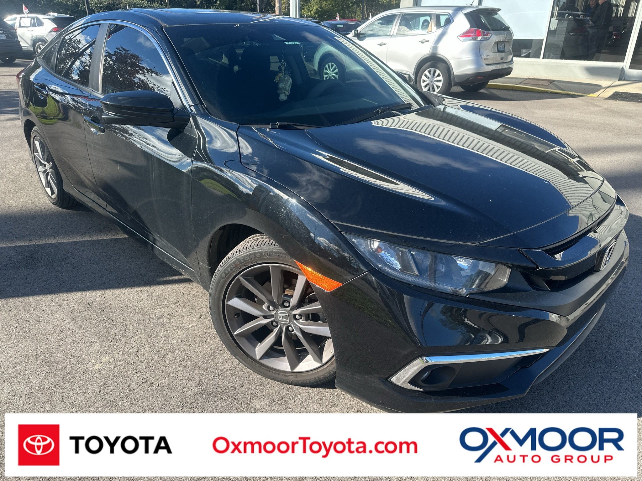 Used 2021 Crystal Black Pearl Honda EX image 1