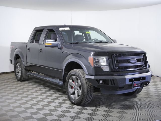 Used 2013 Black Ford FX4 image 1