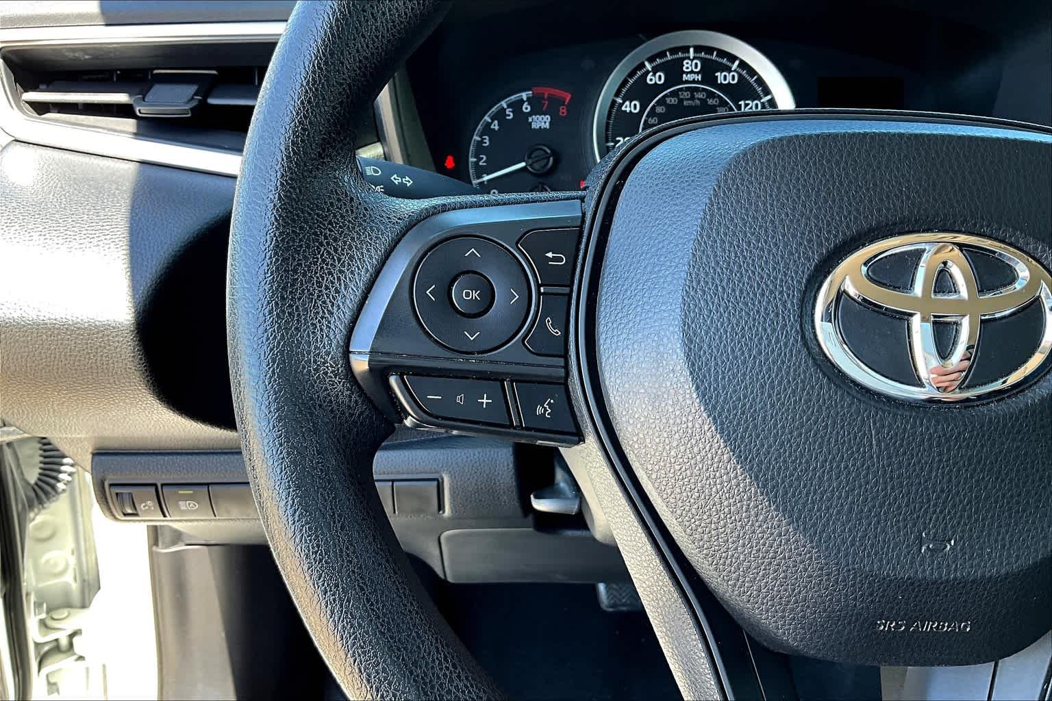 Used 2021 Super White Toyota LE image 24