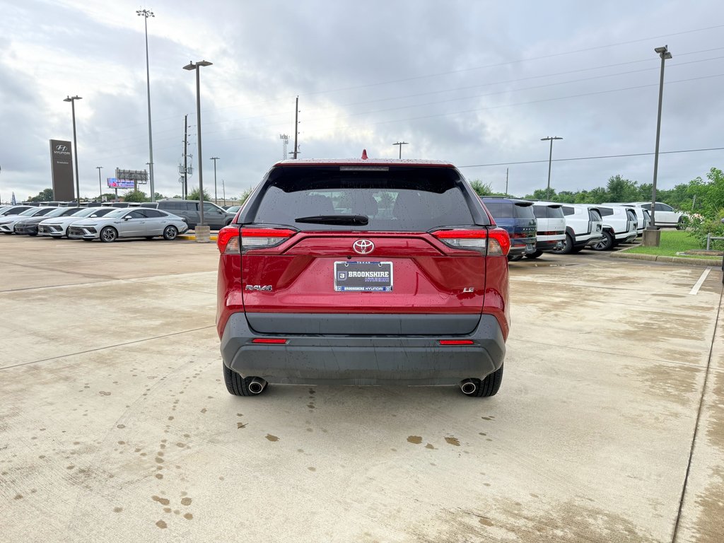 Used 2022 Ruby Flare Pearl Toyota LE image 6