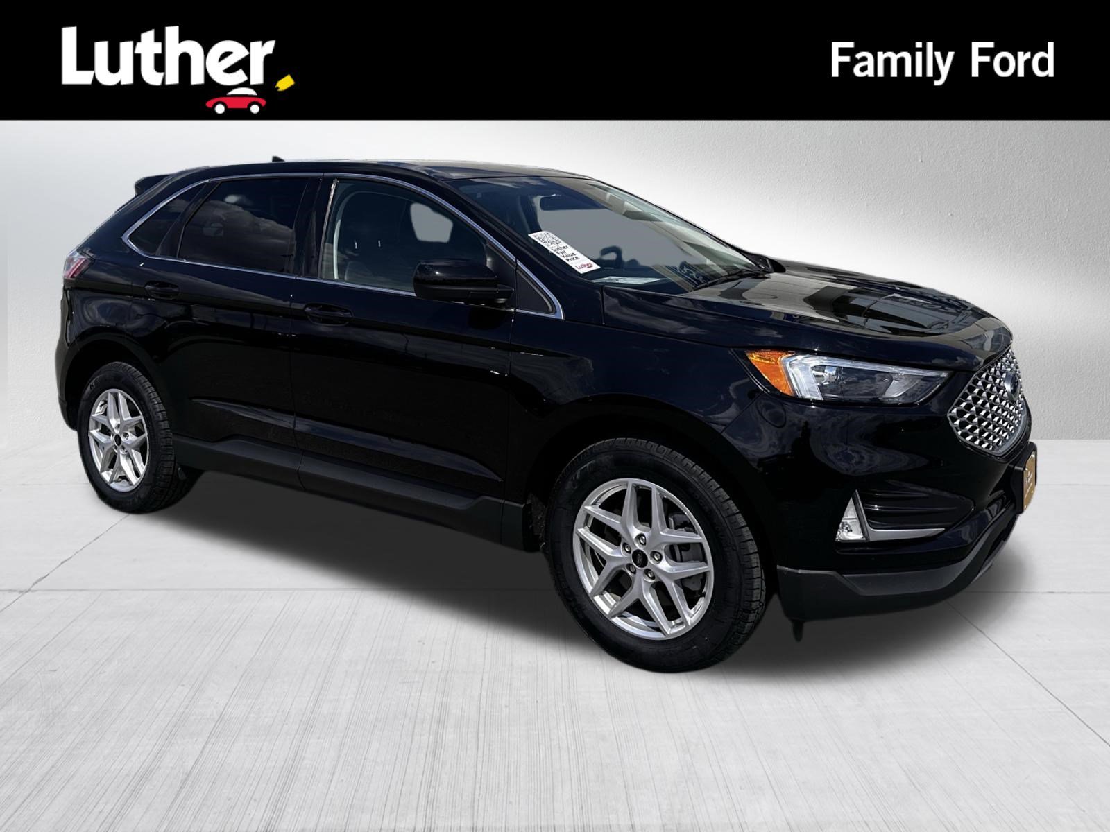 Certified Used 2024 Agate Black Metallic Ford SEL image 1