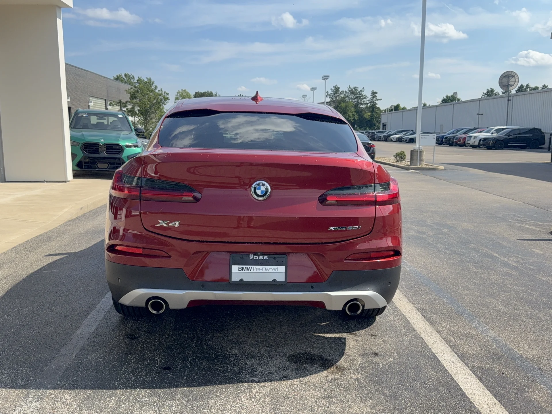 Used 2021 Flamenco Red Metallic BMW xDrive30i image 4